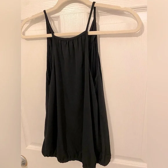 Black, sleeveless spaghetti strap top. Crosses, appears layered in the front. - Picture 3 of 4